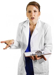 doctor looking confused with a clipboard in her hand